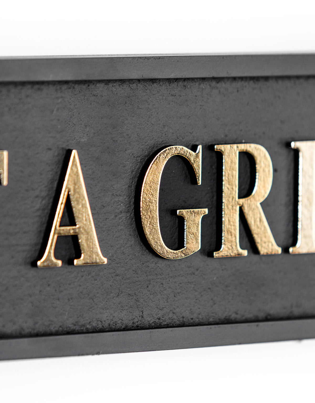 Black & Gold "Get A Grip" Wall Sign
